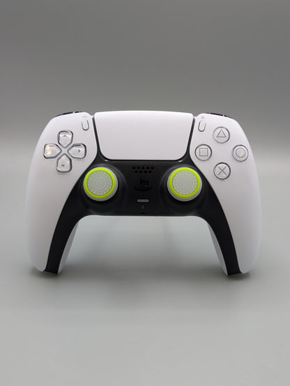 Custom PS5 controller showcasing the GOAT thumbstick toppers in white and yellow - front view