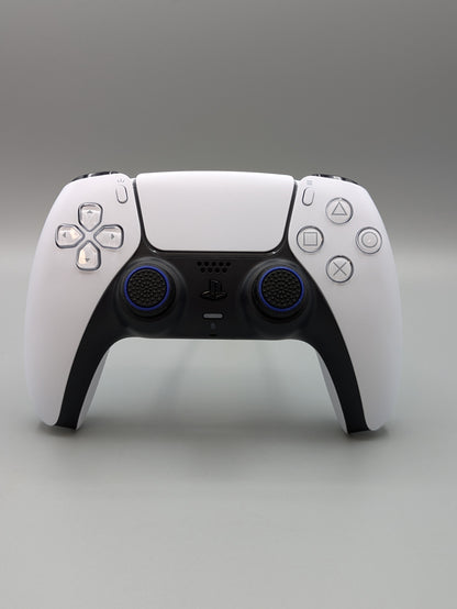 Custom PS5 controller showcasing the GOAT thumbstick toppers in black and blue - front view