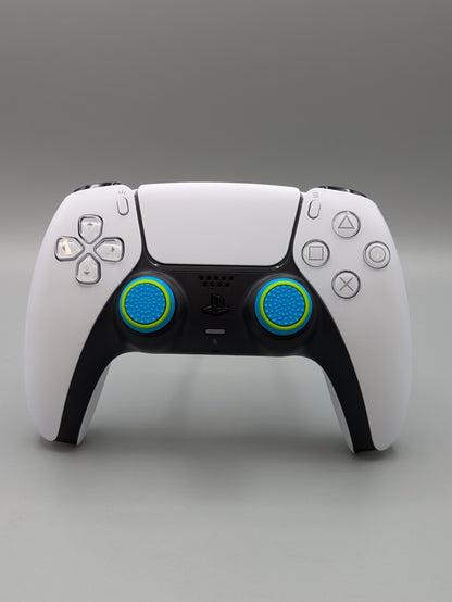 Custom PS5 controller showcasing the GOAT thumbstick toppers in blue and yellow - front view